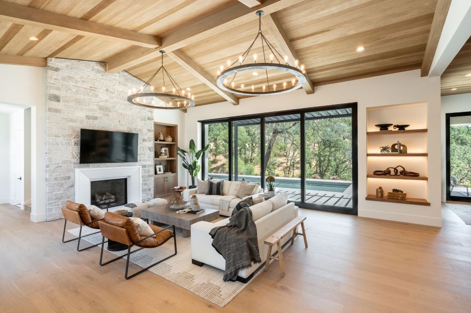 Seating area with a fireplace and patio doors to the outside; Coastside European white oak engineered hardwood for flooring