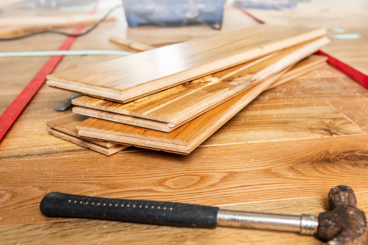 Sideview of engineered hardwood flooring to show its difference vs solid hardwood flooring