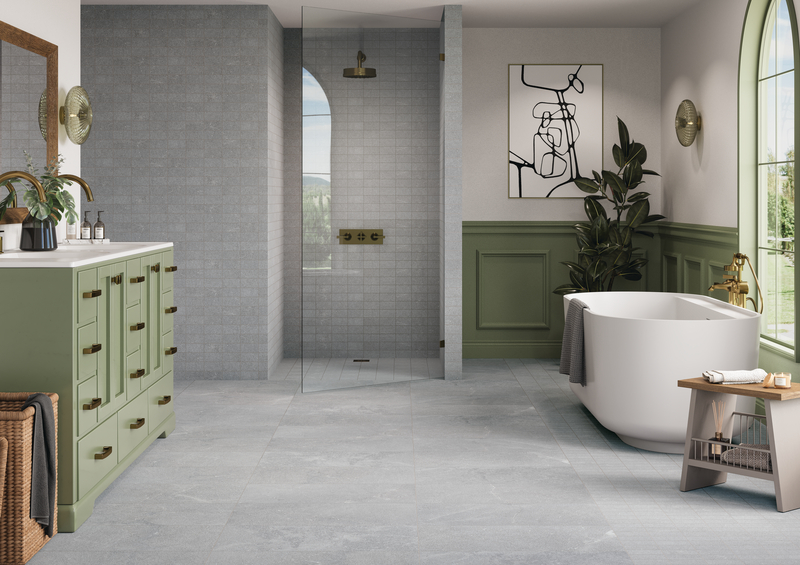 Bathroom with a tub, vanity, and walk-in shower with a porcelain tile floor