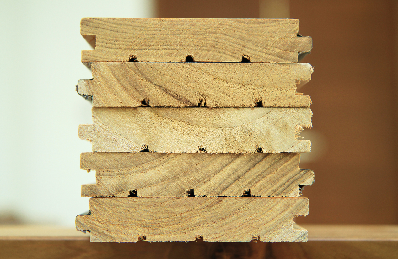 Sideview of solid hardwood to show its difference from engineered hardwood