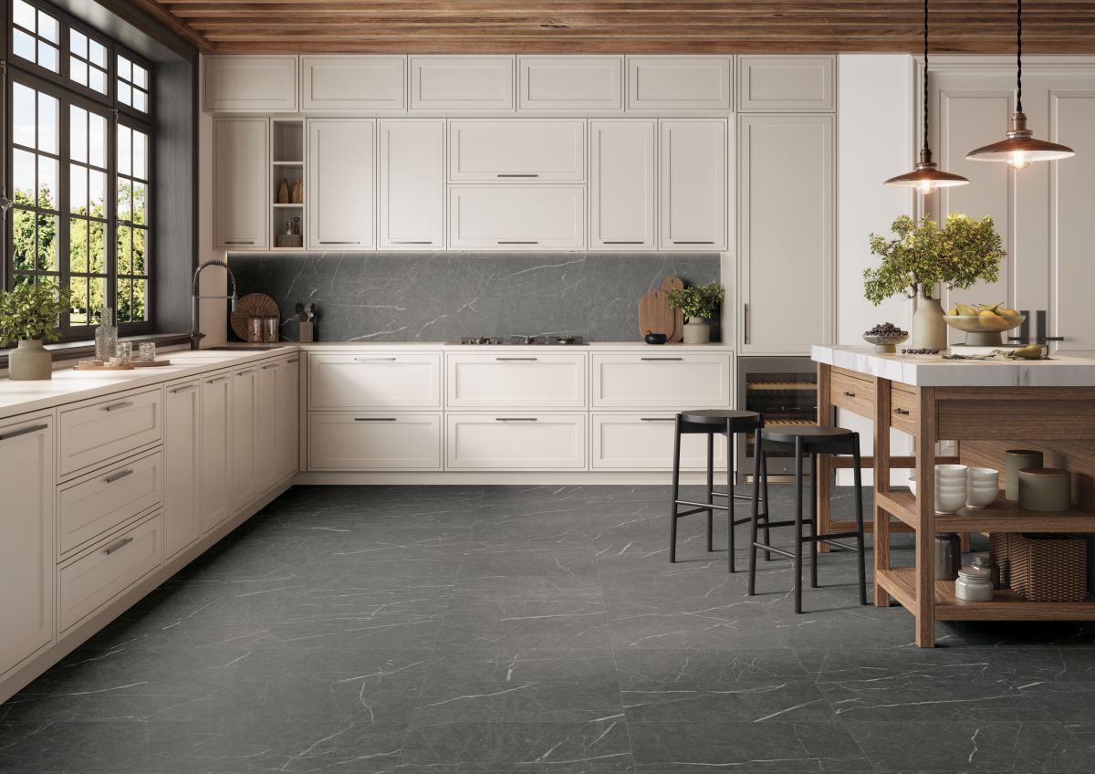 Kitchen scene with marble-look porcelain tile flooring