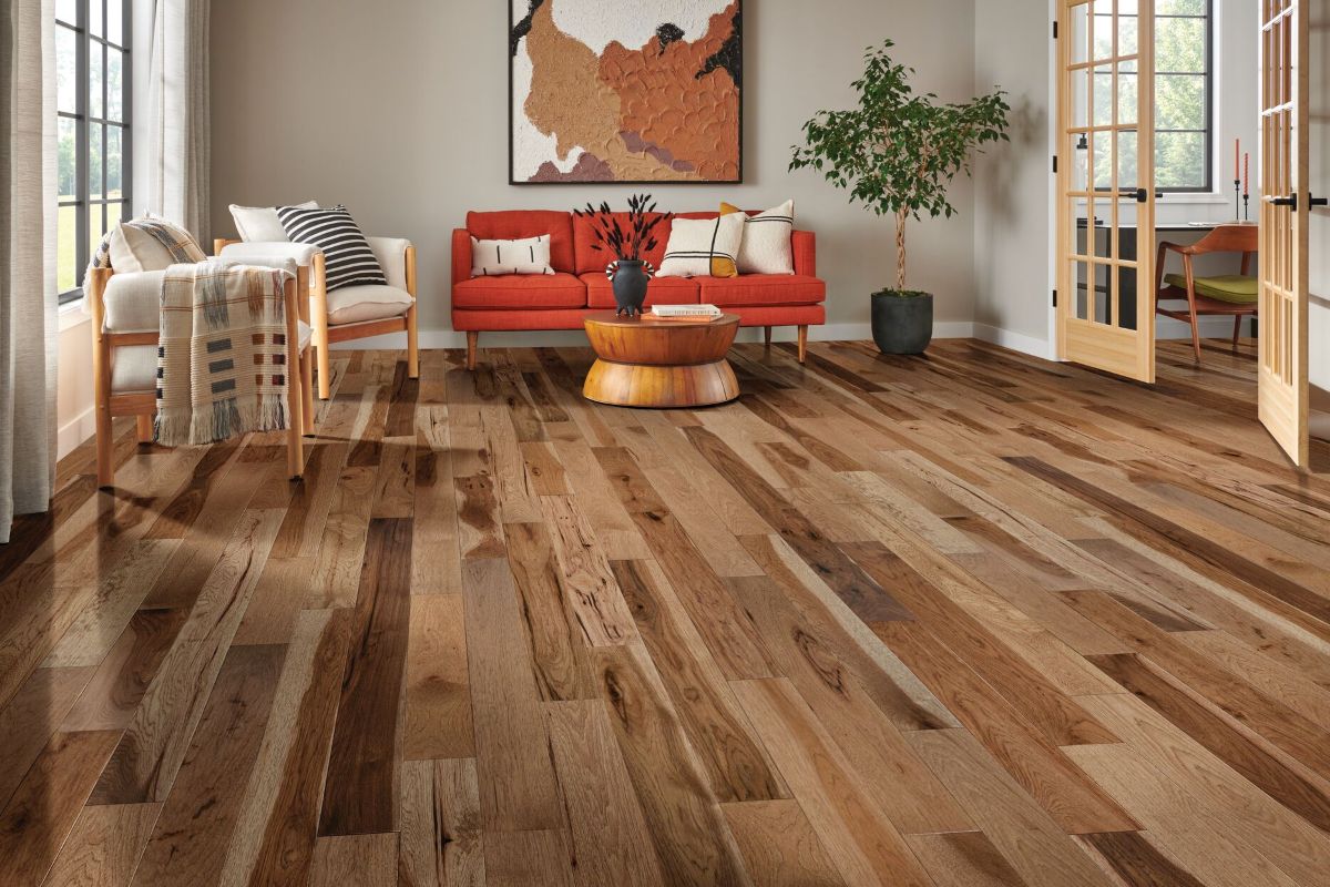 How to choose flooring for you home: solid hickory hardwood floor in a living room