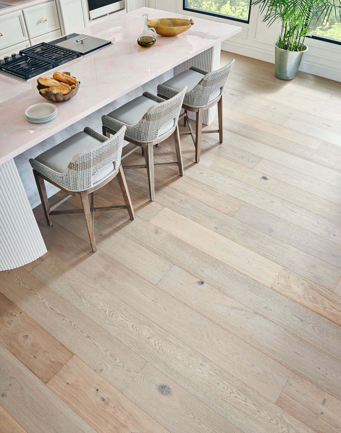close up of an engineered hardwood floor at a kitchen island